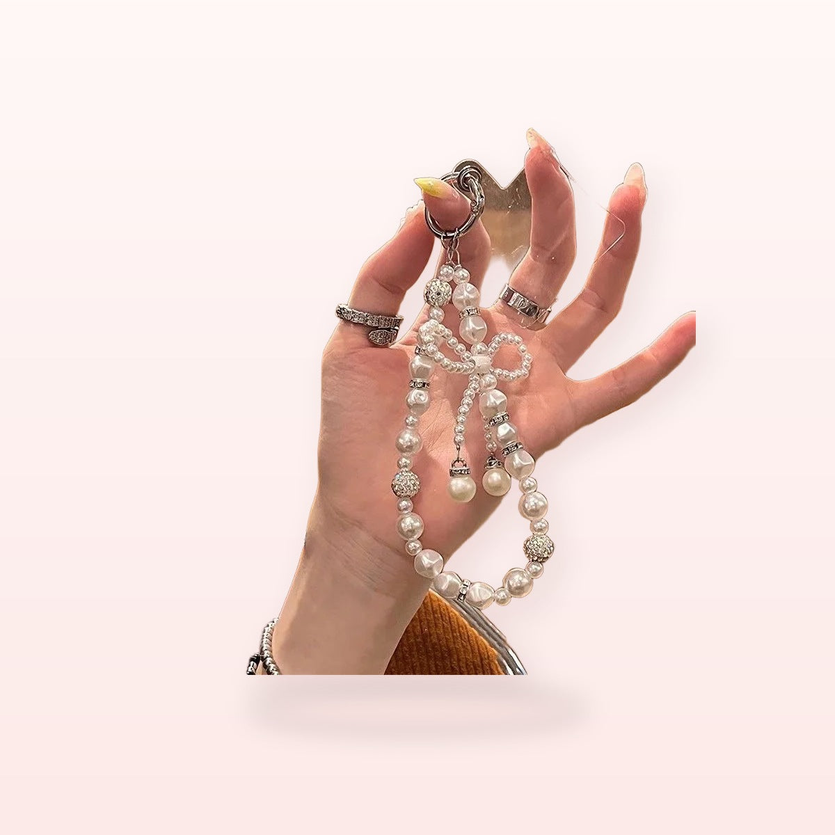 SIMPLYBUBBI Pearl Wrist Phone Strap - Image 1