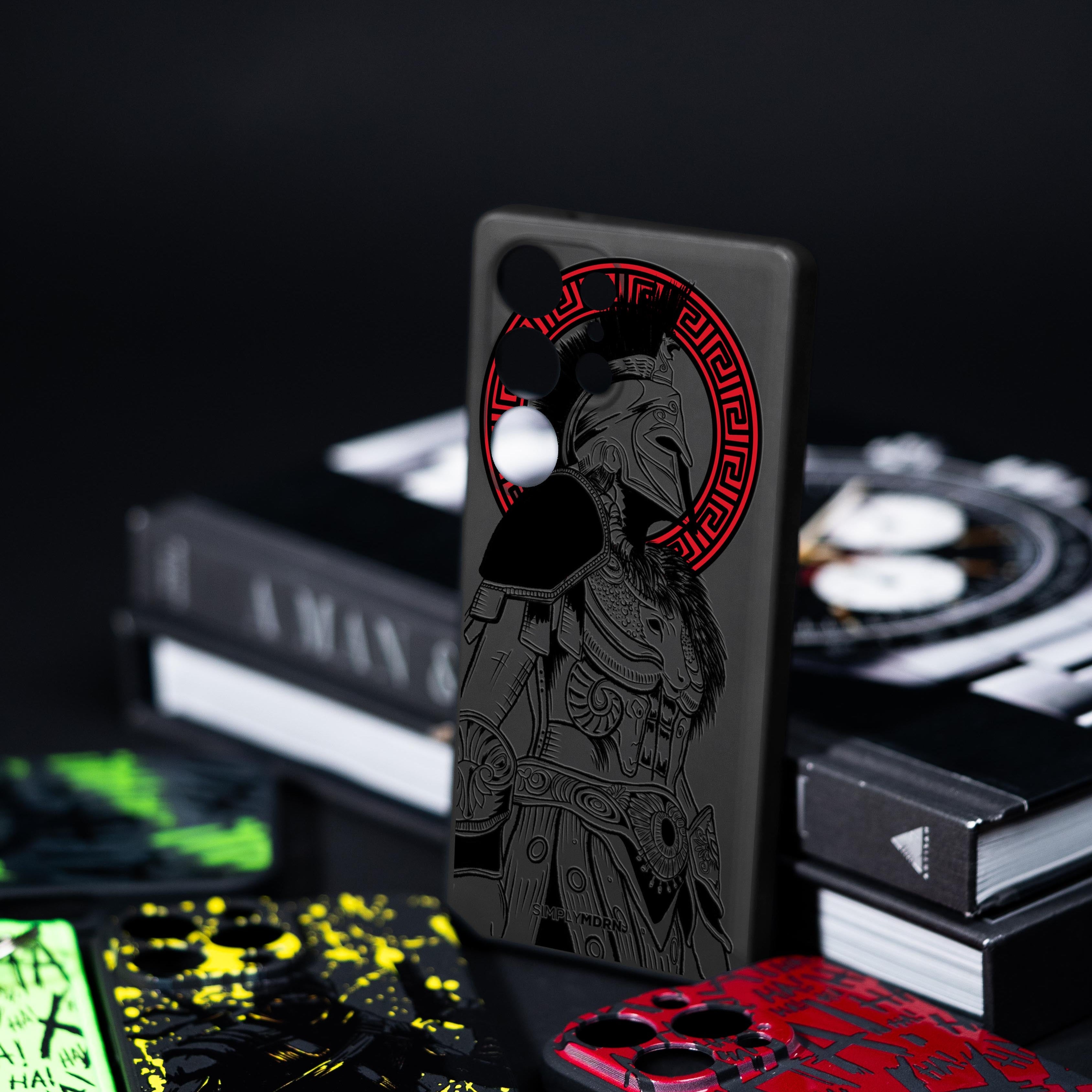 Collection of phone cases with unique designs on a dark surface