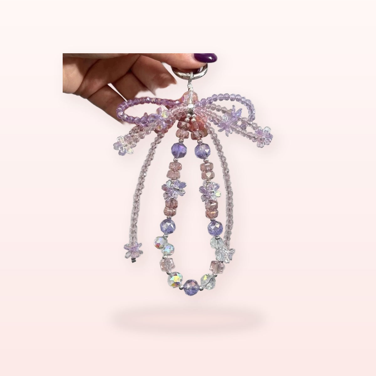 SIMPLYBUBBI Purple Bow Crystal Wrist Chain - Image 1