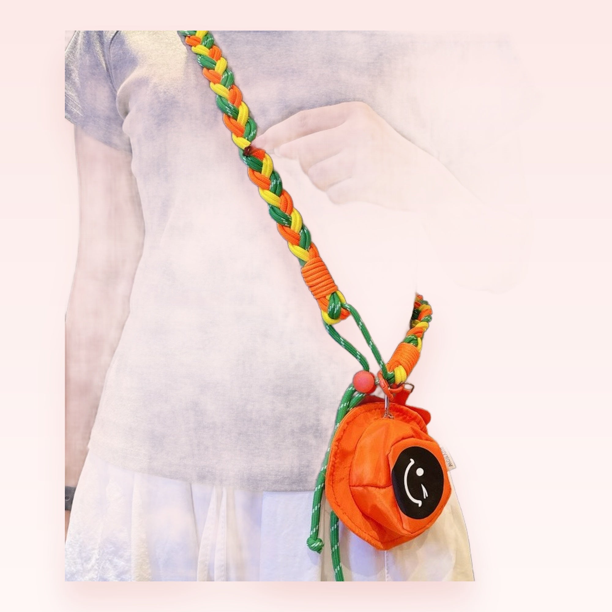 SIMPLYBUBBI — Braided Rainbow Cord Crossbody | Orange Smiley Ball Pouch Lanyard