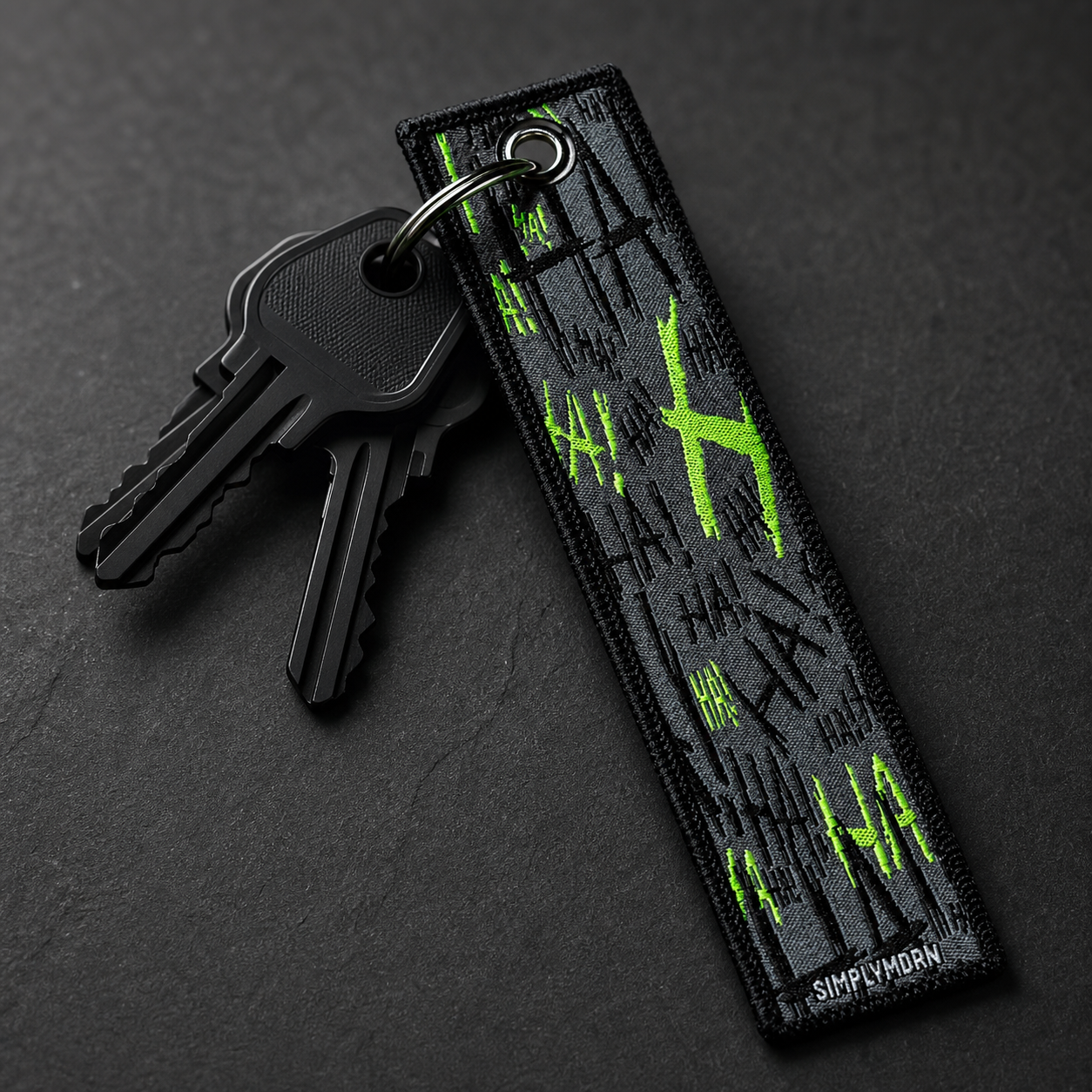 JOK3STER embroidered keychain with matte black keys